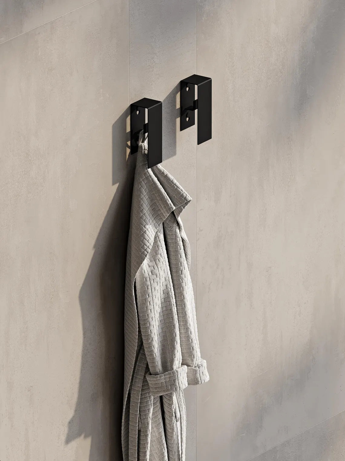 Ganci da parete in metallo nero per il bagno