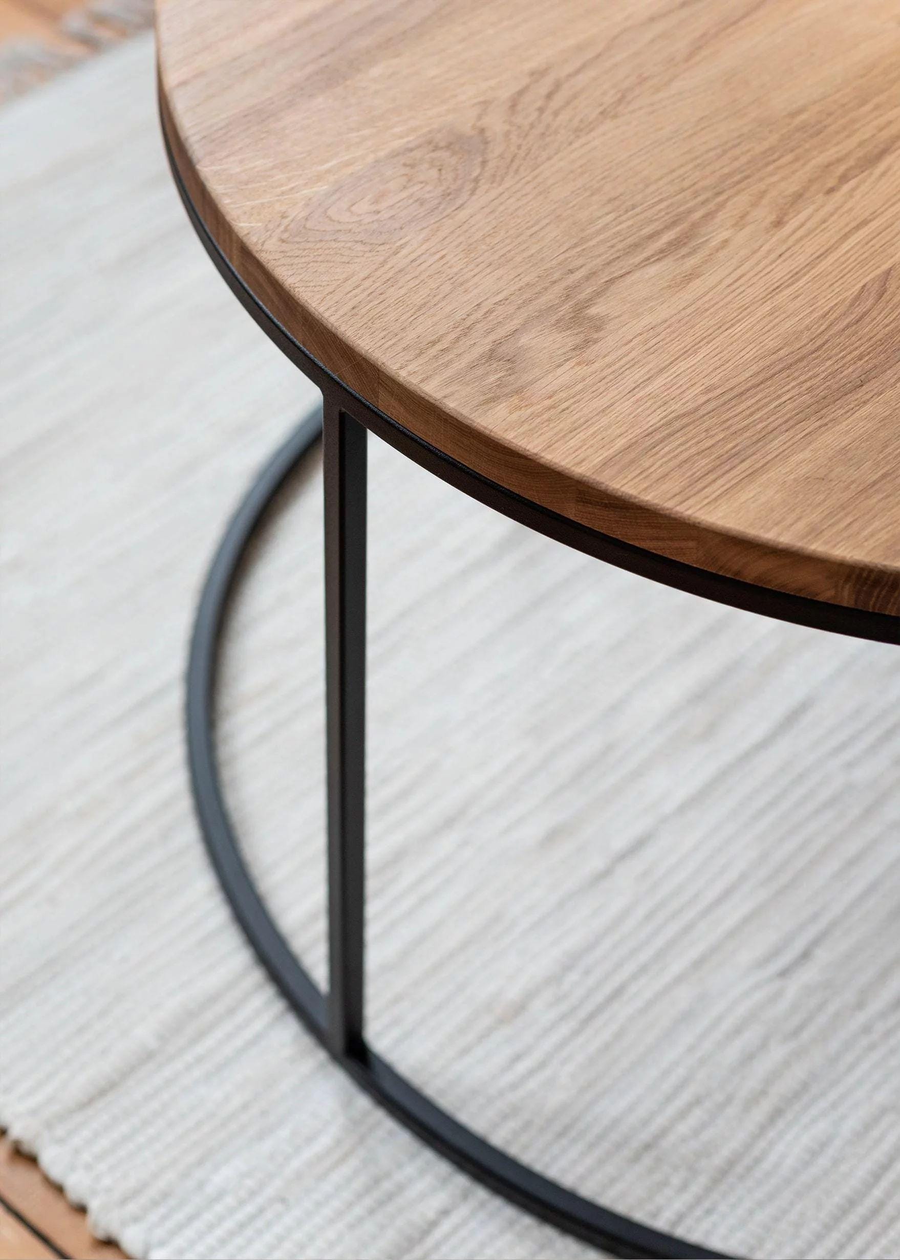 coffee table
coffee tables
wood coffee table
metal coffee table
wood and metal table
round coffee table
round table
coffee table wood
living room table
big coffee table
natural wood table
unique coffee table
unique table