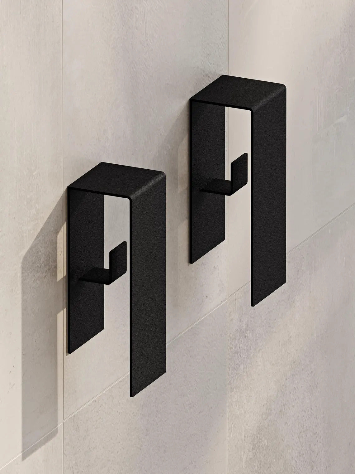 Ganci da parete in metallo nero per il bagno